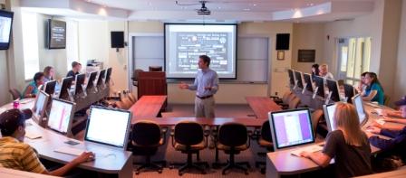 Dr. John A. McArthur teaches in the Knight-Crane Convergence Laboratory in the James L. Knight School of Communication at Queens University of Charlotte